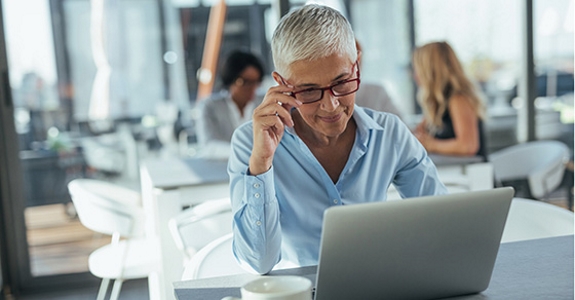 Older woman using laptop