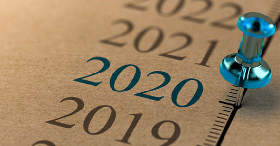 Paper timeline of years with push pin next to 2020